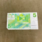 This selection of vintage Dutch Guilder banknotes from the 1960s and 1970s includes denominations of 5, 10, and 25 Gulden, each showcasing distinctive Dutch design and cultural heritage. Issued by De Nederlandsche Bank, these notes feature iconic imagery such as the statue of Erasmus (ƒ5), Baruch Spinoza (ƒ10), and Michiel de Ruyter (ƒ25), reflecting the country’s historical and intellectual legacy. Printed in bold colours and artistic styles, these notes are no longer in circulation, having been replaced b