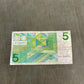 This selection of vintage Dutch Guilder banknotes from the 1960s and 1970s includes denominations of 5, 10, and 25 Gulden, each showcasing distinctive Dutch design and cultural heritage. Issued by De Nederlandsche Bank, these notes feature iconic imagery such as the statue of Erasmus (ƒ5), Baruch Spinoza (ƒ10), and Michiel de Ruyter (ƒ25), reflecting the country’s historical and intellectual legacy. Printed in bold colours and artistic styles, these notes are no longer in circulation, having been replaced b
