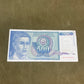 This collection of vintage Yugoslavian banknotes features a mix of denominations and designs from the former Socialist Federal Republic of Yugoslavia, a nation that dissolved in the early 1990s. Spanning several decades—primarily from the 1950s to the 1990s—these notes reflect the country’s dynamic political and economic history. Denominations may include 10, 50, 100, 500, 1,000, 5,000, or even hyperinflation-era notes in the millions, with portraits of workers, scholars, and historical figures, along with 
