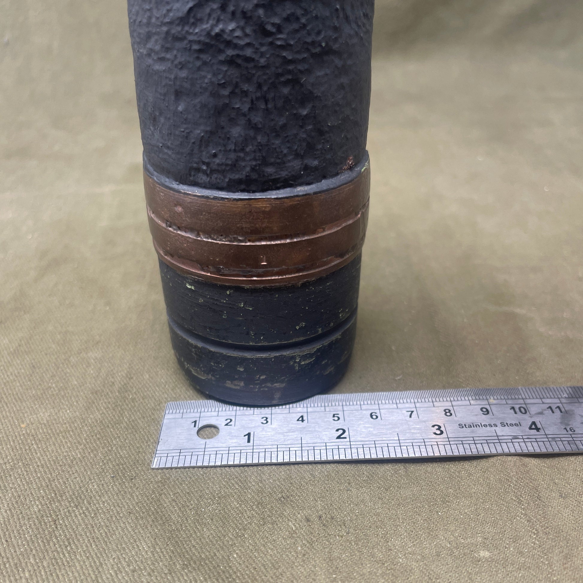 Explore the British 6 Pdr (57mm) Common Pointed Explosive Shell with Base Fuze, a key World War II artillery round. Discover its role in anti-tank warfare, advanced design, and historical significance, reflecting the innovation and resilience of the British armed forces