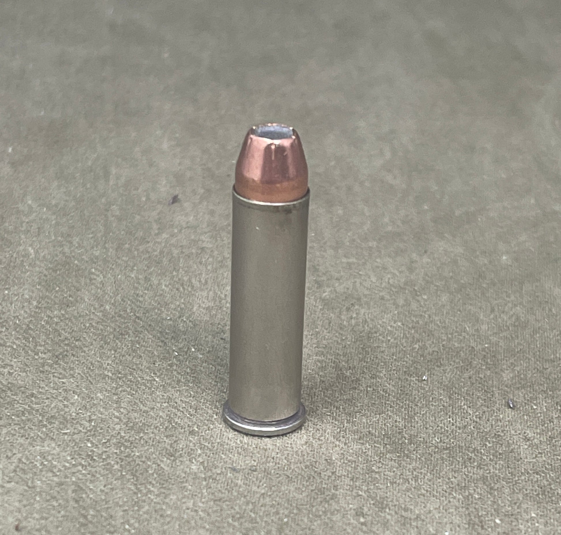 Bullet casing on a concrete surface