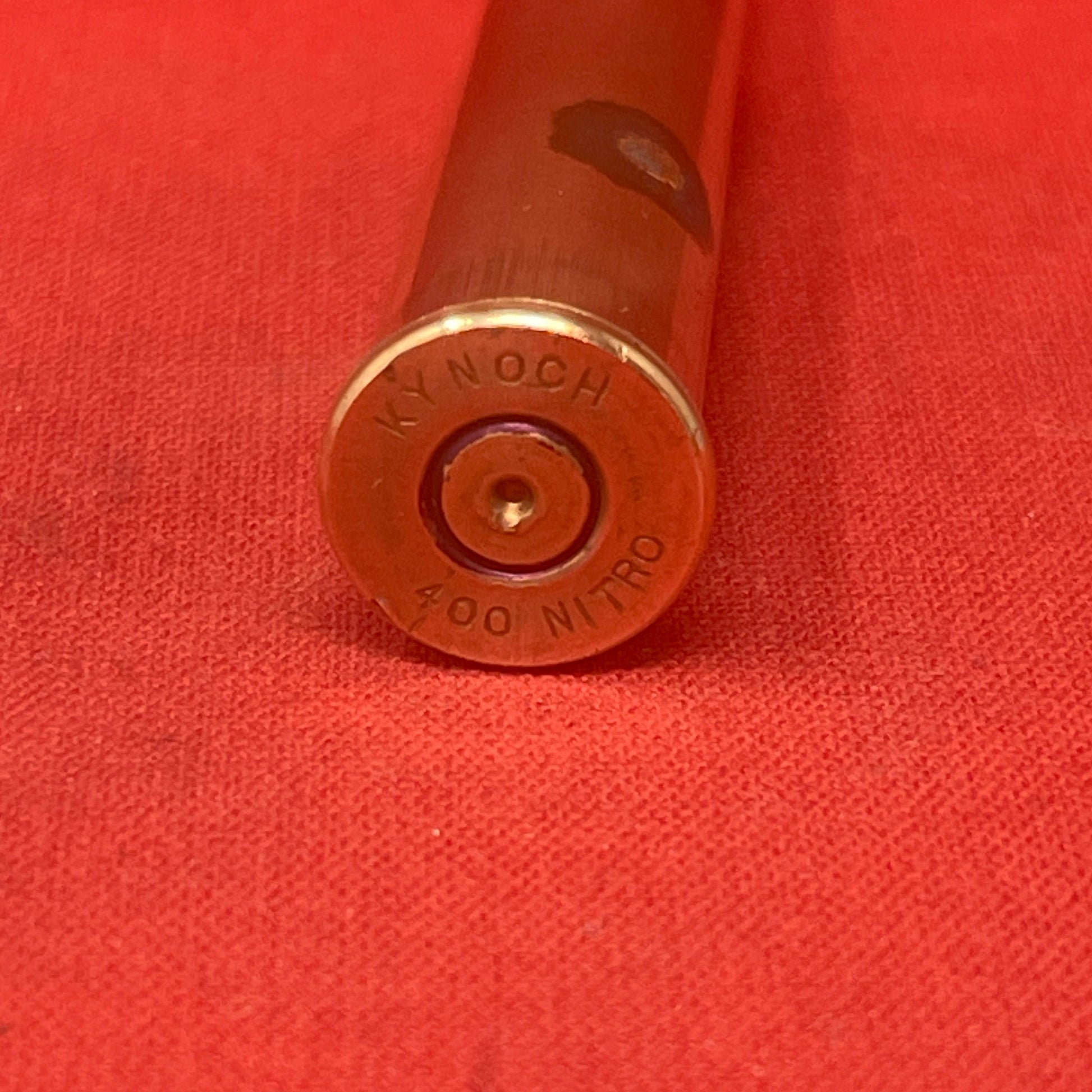 The Kynoch .400 Nitro Express Cartridge Case is a trusted choice among hunters for its reliability and effectiveness in medium to large game hunting. Featuring a robust, rimmed brass construction and accommodating a 400-grain bullet, it delivers consistent performance and deep penetration. Ideal for diverse hunting environments, it is favored for its manageable recoil and precise accuracy.