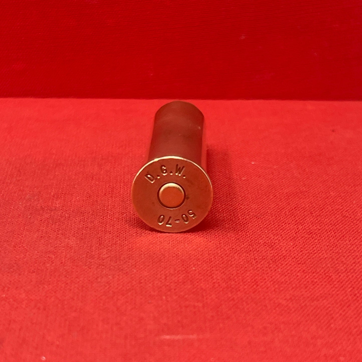 Discover the DGW 50-70 Cartridge Case, a historical round celebrated for its role in early American firearms. Featuring a rimmed brass design and firing a 450-grain bullet, it offers moderate power for medium-sized game. Known for reliability and accuracy, it appeals to collectors and enthusiasts of vintage firearms, reflecting a cherished era of American frontier hunting and shooting traditions