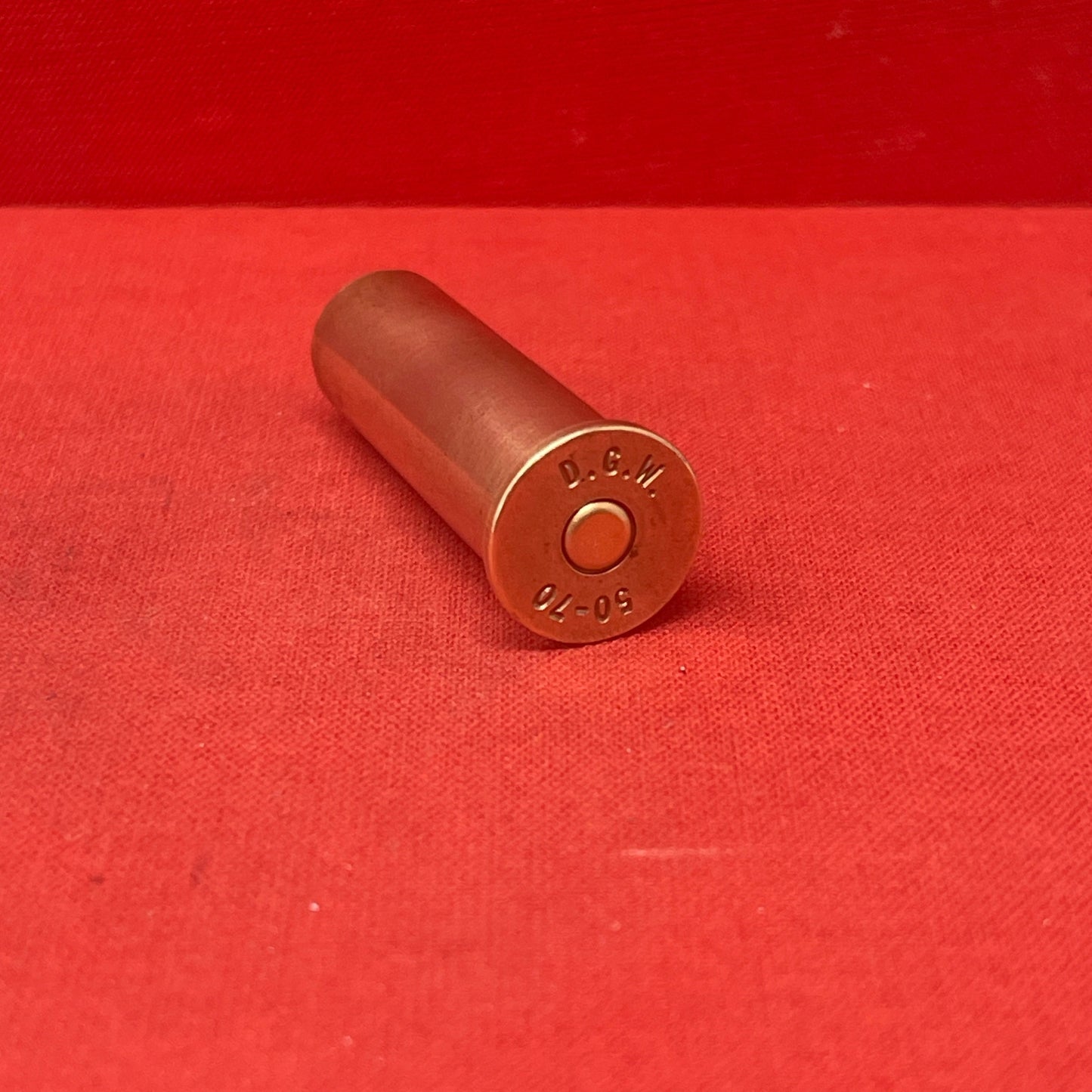 Discover the DGW 50-70 Cartridge Case, a historical round celebrated for its role in early American firearms. Featuring a rimmed brass design and firing a 450-grain bullet, it offers moderate power for medium-sized game. Known for reliability and accuracy, it appeals to collectors and enthusiasts of vintage firearms, reflecting a cherished era of American frontier hunting and shooting traditions