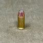 Bullet on a textured gray surface