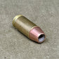 Bullet casing on a textured surface