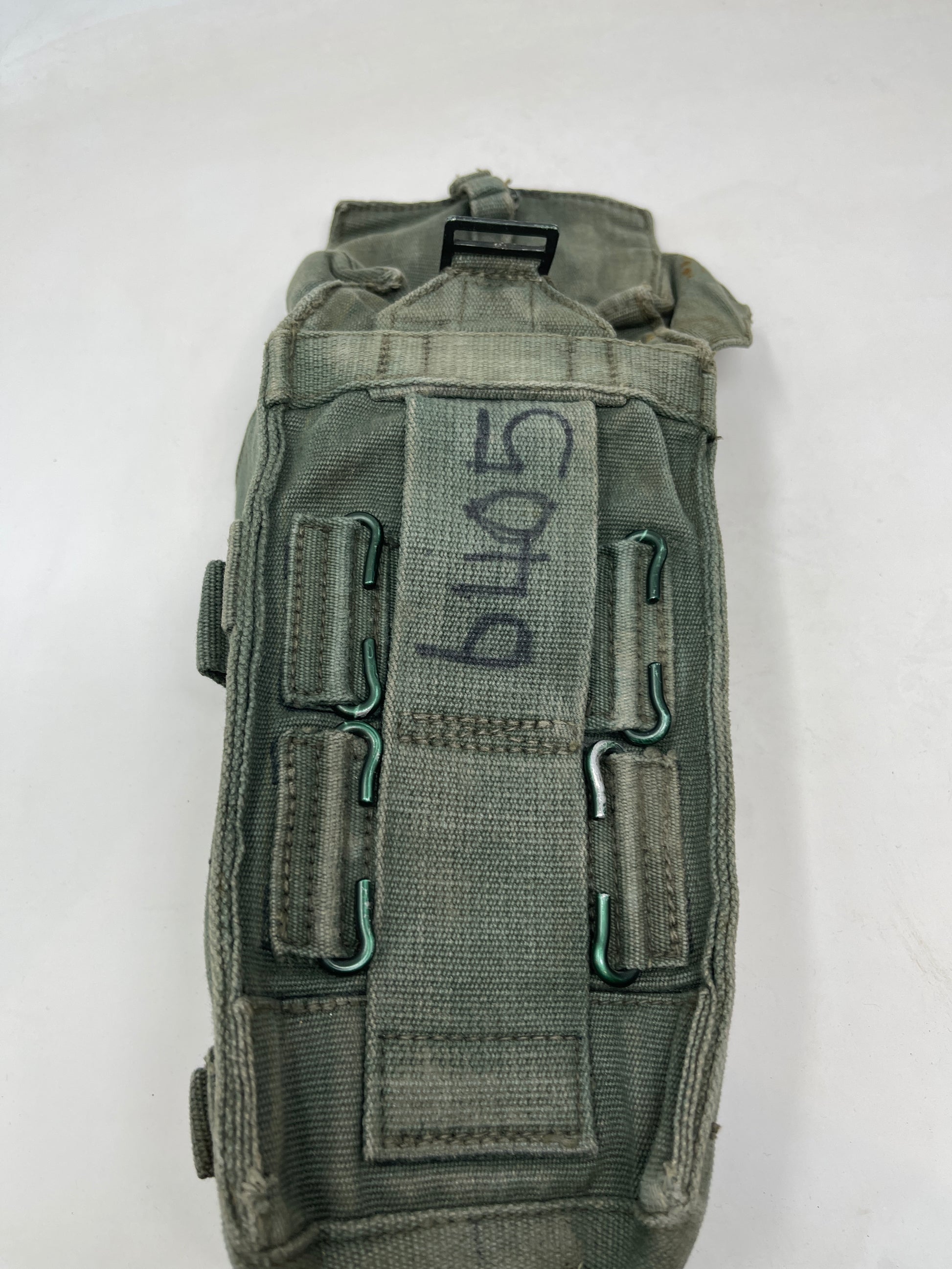 a good example of the 1944 pattern british webbing ammunition pouch from the rear