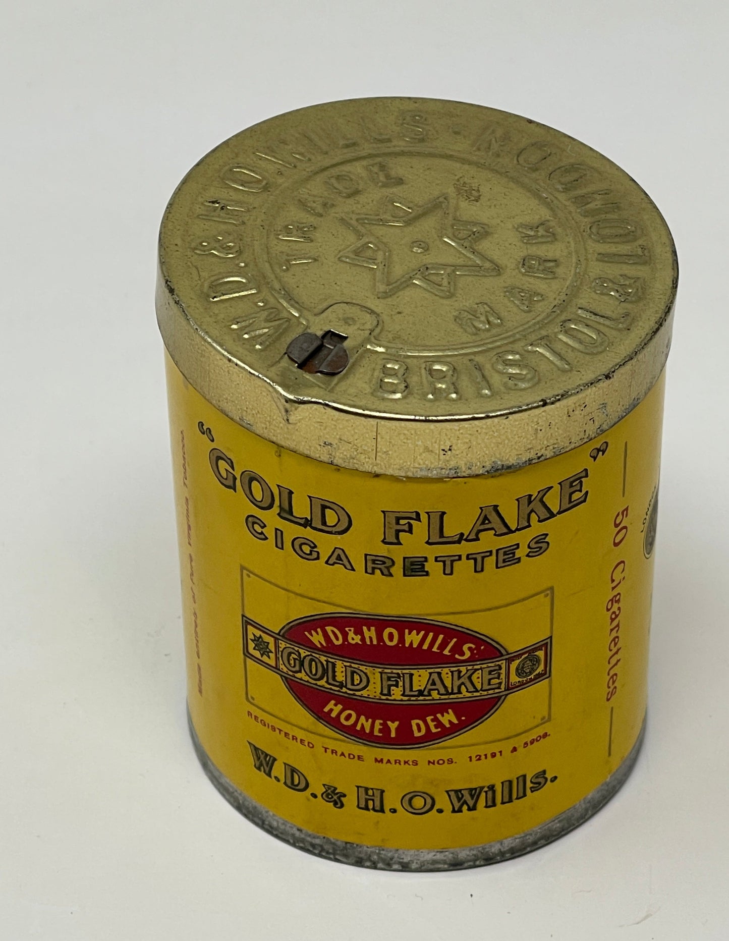 top view of an Airtight Sealed Can of 50 Gold Flake Cigarettes with lid on