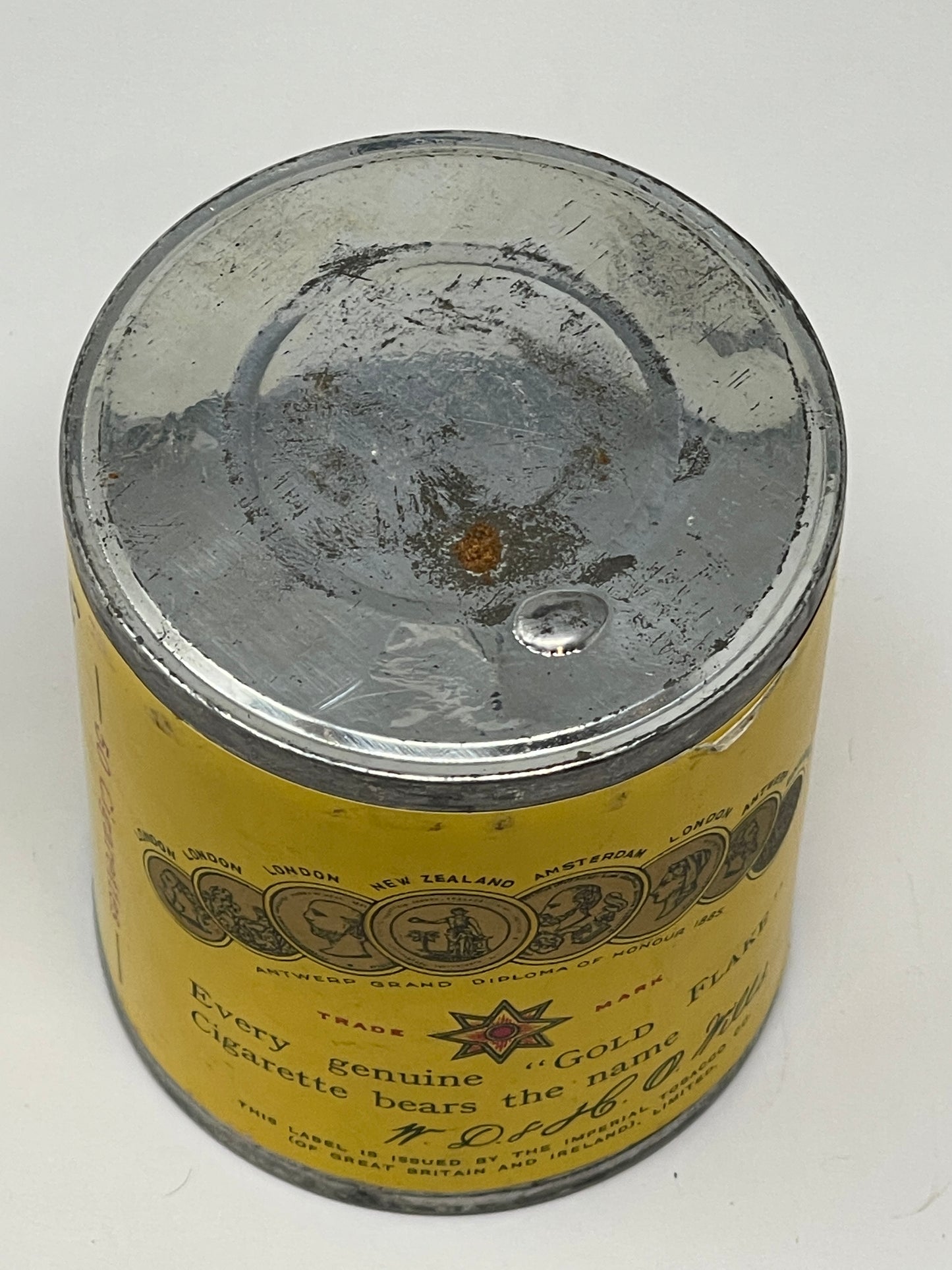 top view of an Airtight Sealed Can of 50 Gold Flake Cigarettes