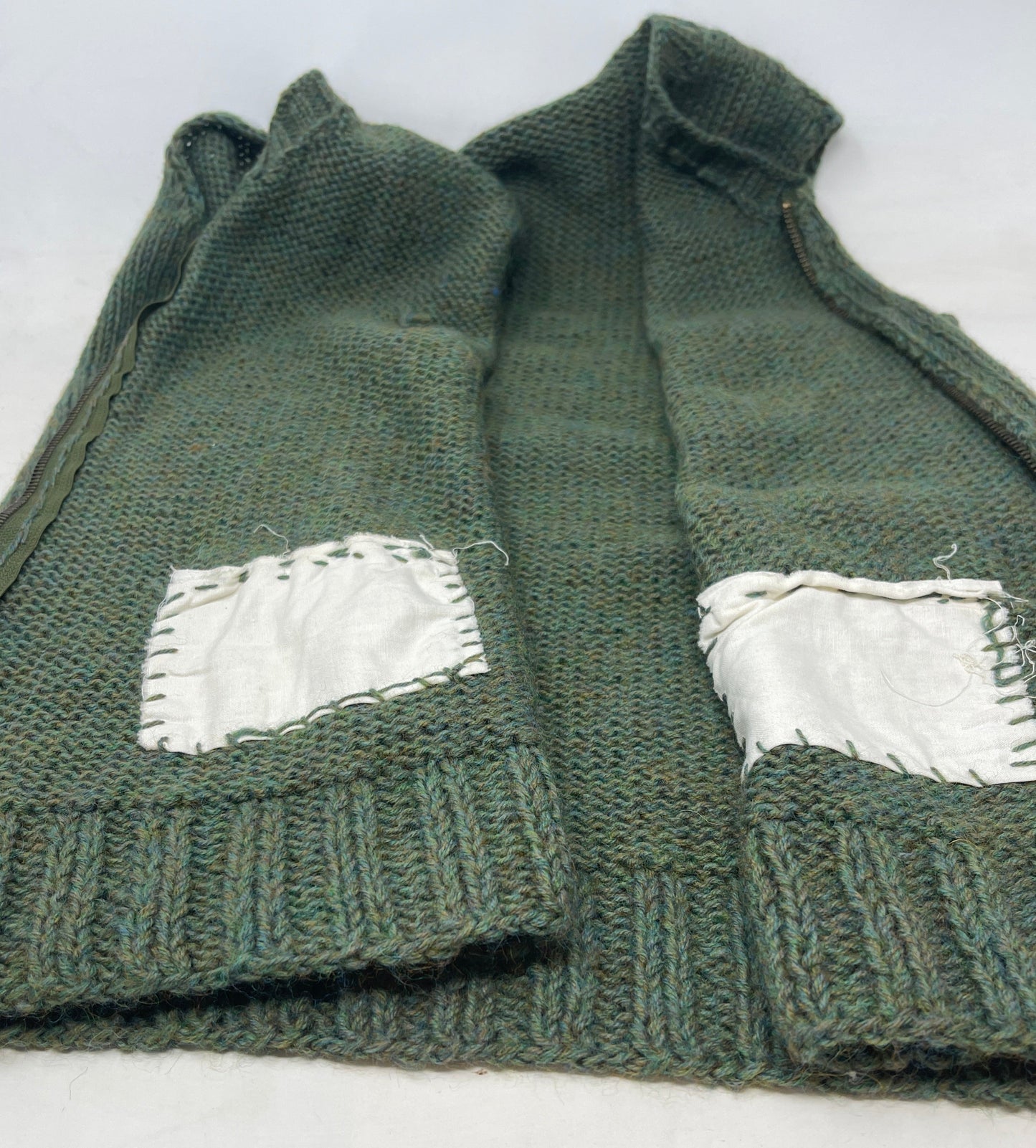 inside view showing pockets of home front knitted soldiers waist coat