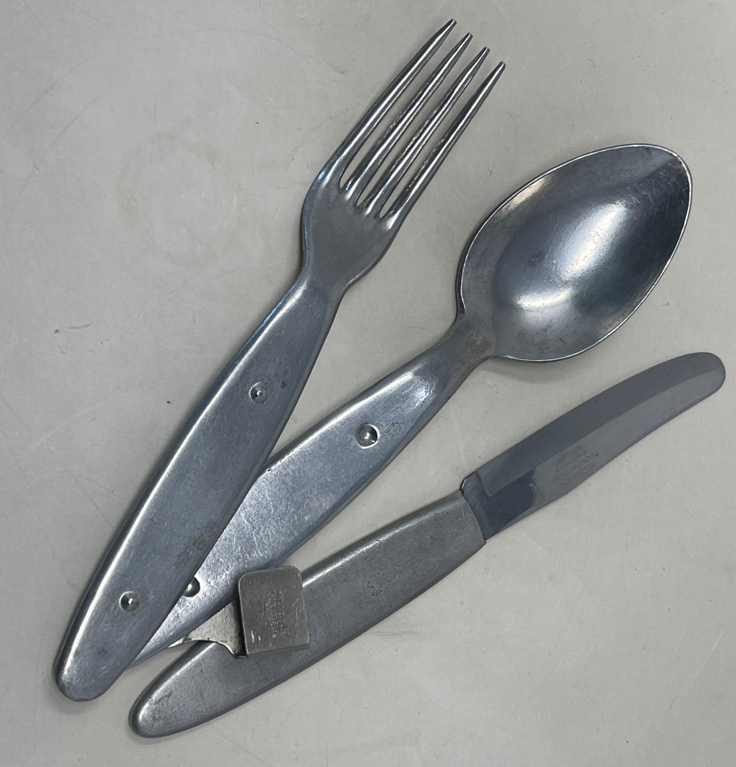 Knife, fork, and spoon set dated 1944